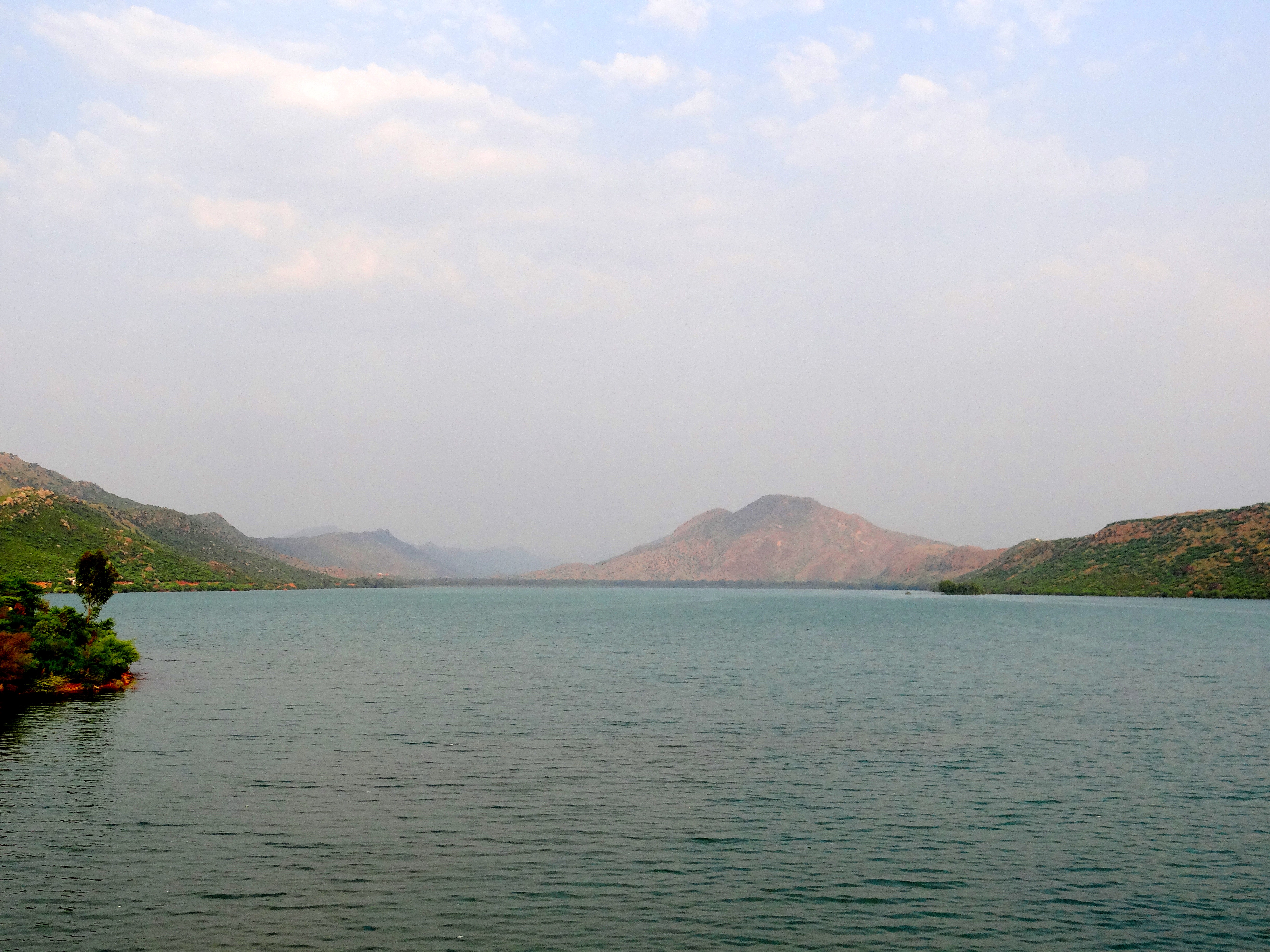 Small Dam Naryab reservoir basin surrounded by rocky ridges